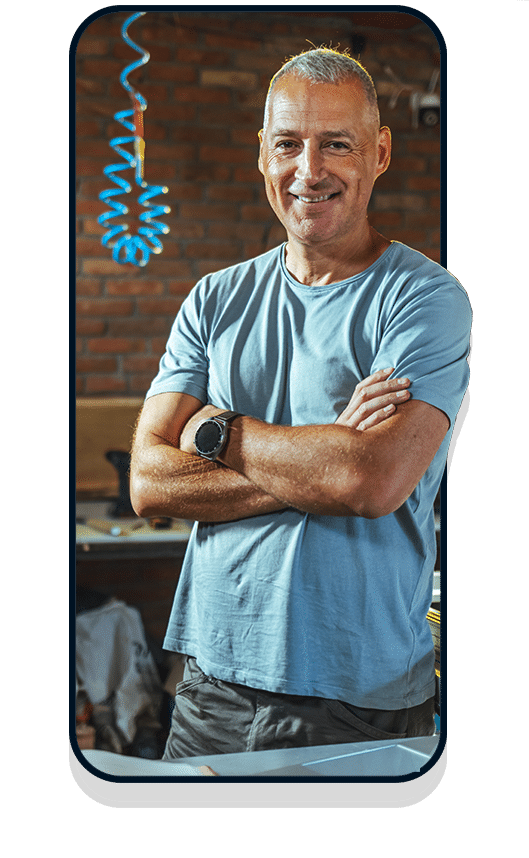 Business owner in blue t-shirt in mobile frame